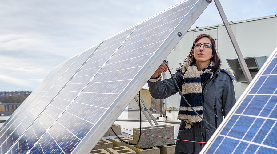 woman with solar panels