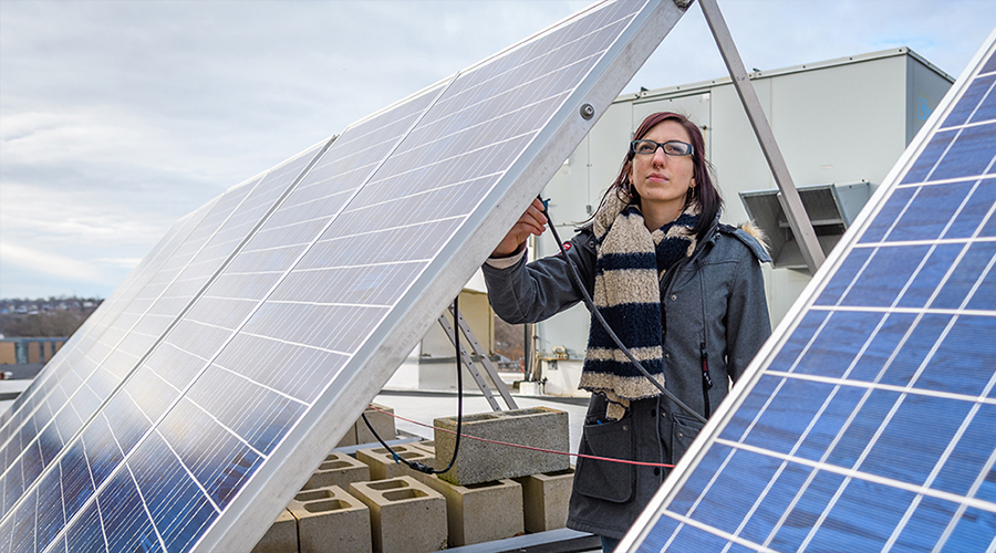 woman with solar panels