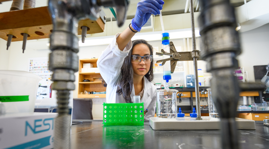 Diana Argiles Castillo doing lab work