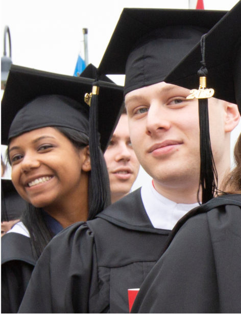 grad students in caps and gowns