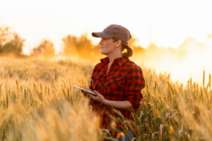 farmer in field with tablet