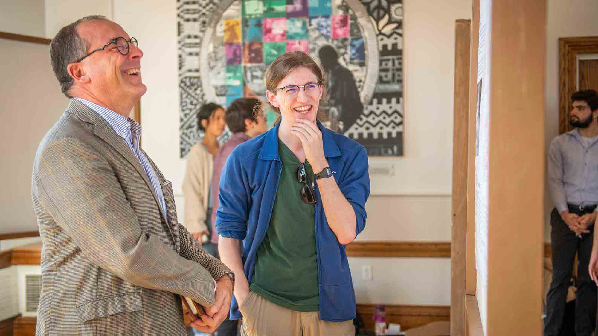 Provost Sebastián Royo and Samuel Cooper ’24 share a laugh during ClarkFEST on Oct. 25.