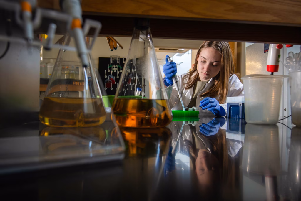 Biochemistry student Taylor Laflamme ’23, M.S. ’24 working in the lab.