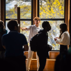 A student presents his research at ClarkFest