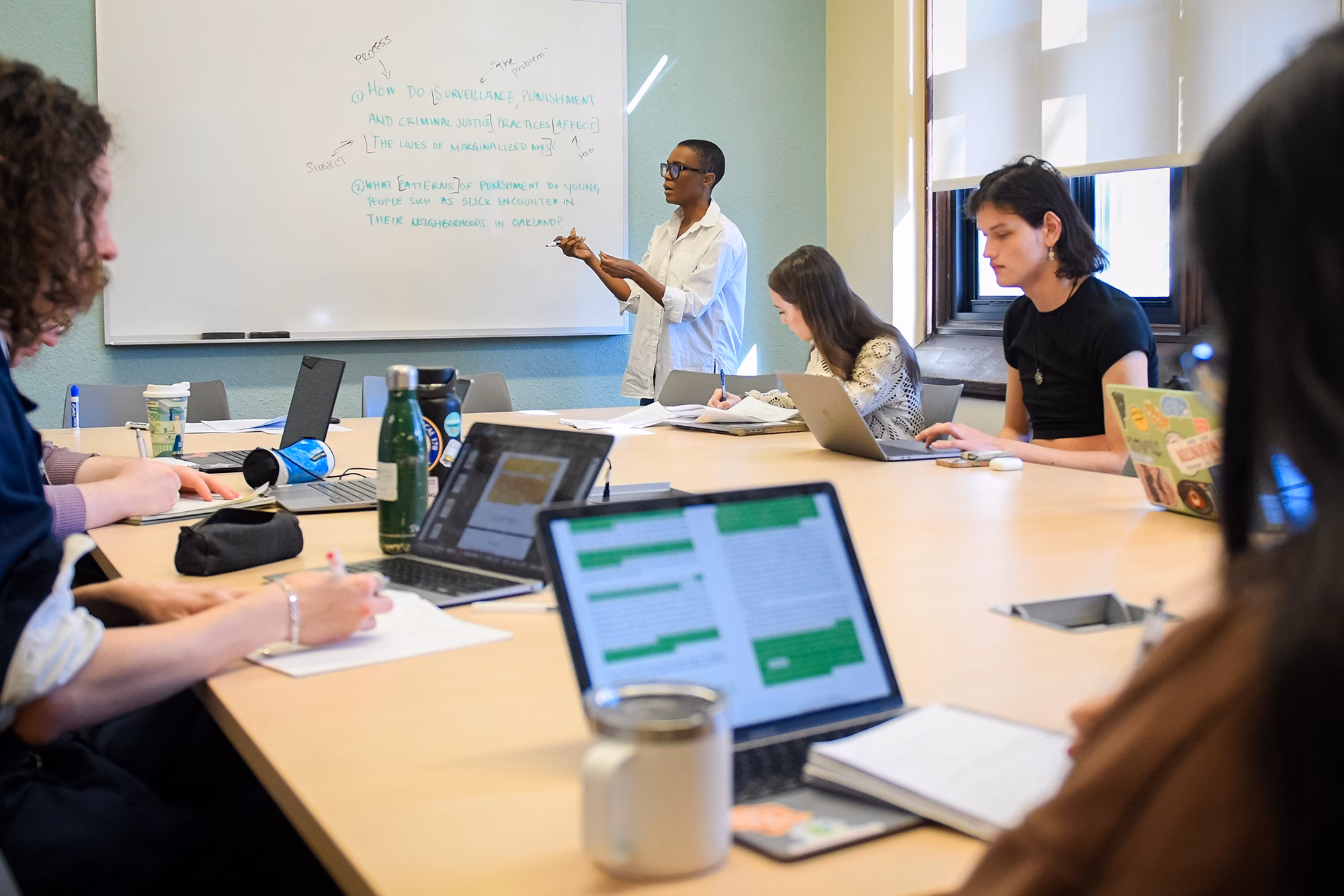 Professor Asha Best leads a class discussion around policies that support equity in our cities.