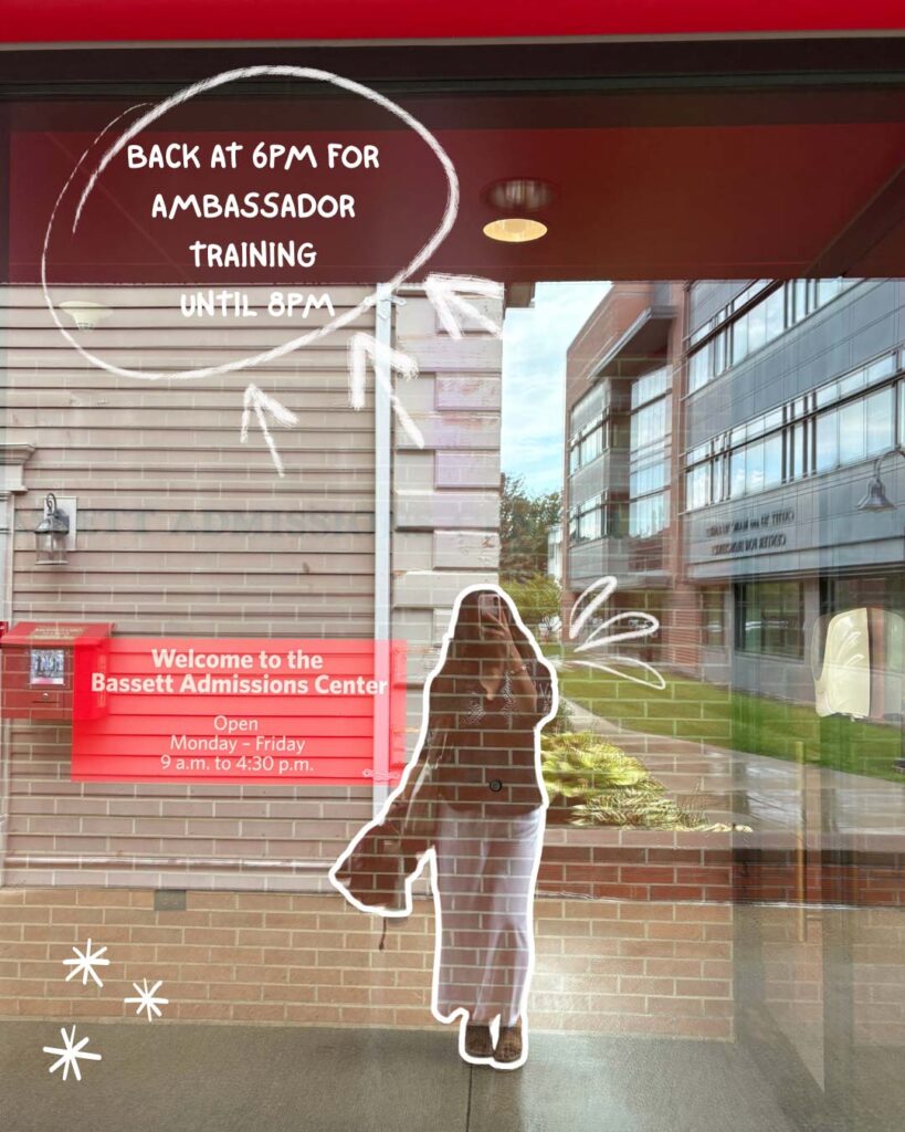 Turna Barua ’26 Day in the Ƶ series: selfie in a glass reflection in front of the admissions center with handwritten note "Back at 6PM for ambassador training until 8PM."