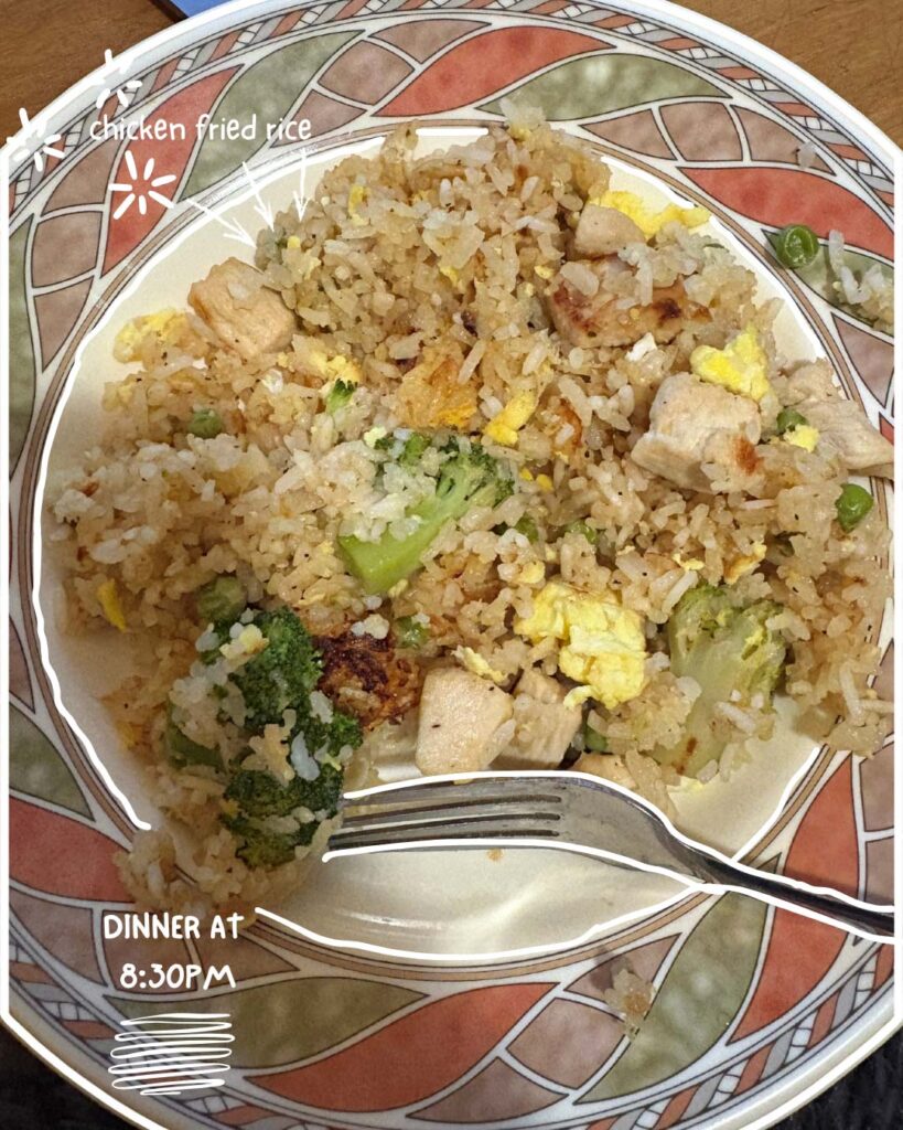 Turna Barua ’26 Day in the Ƶ series: Close up of vegetables and rice meal with handwritten note "Dinner at 8:30PM."