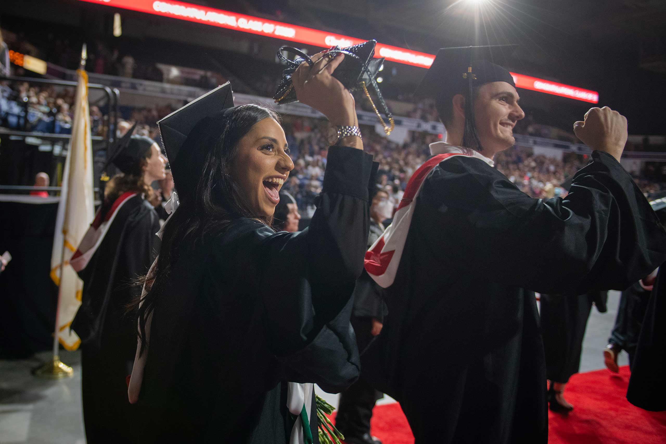Students celebrating at the undergraduate commencement ceremony, 2025