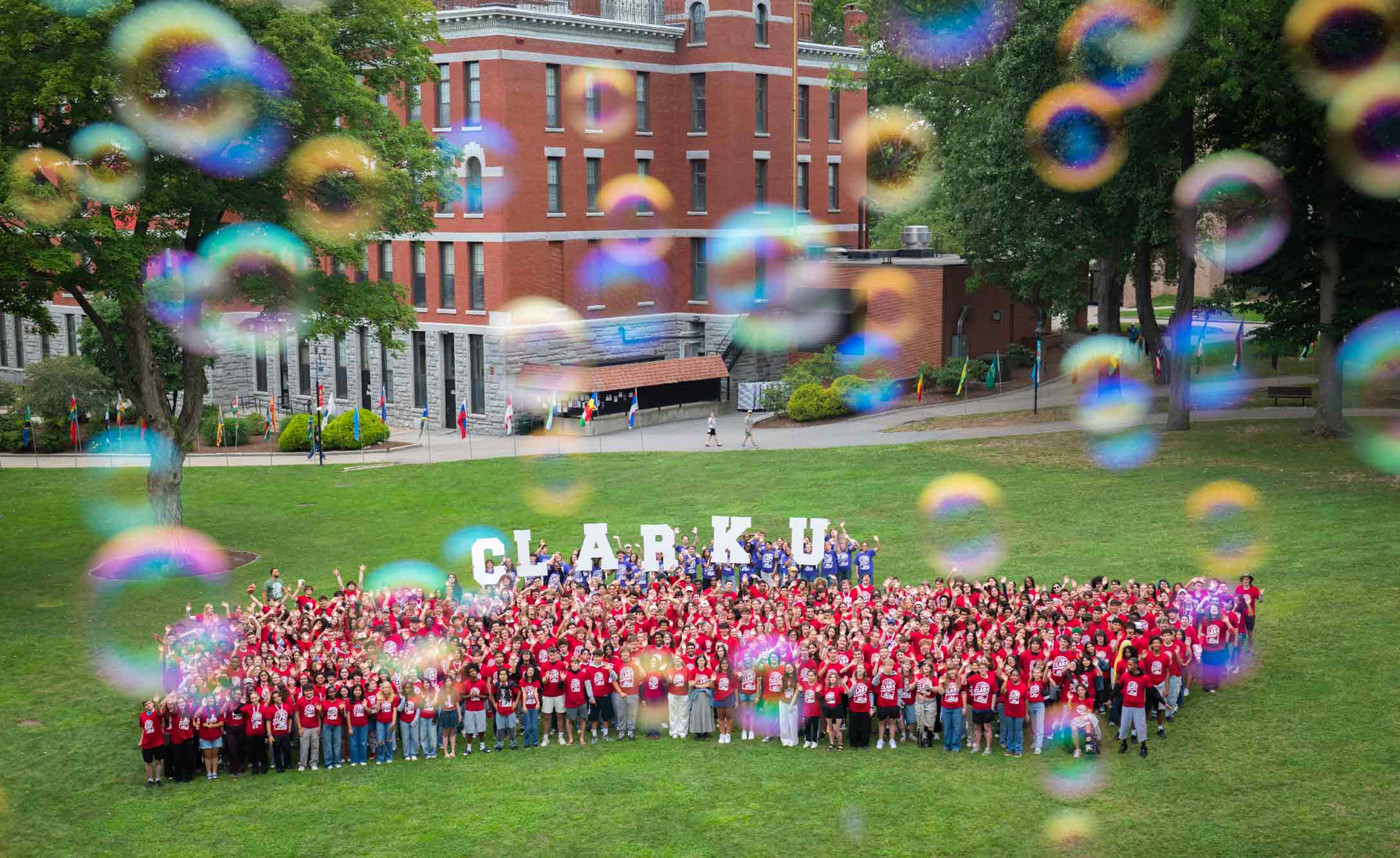 Group shot of the class of 2031 with bubbles in the foreground.