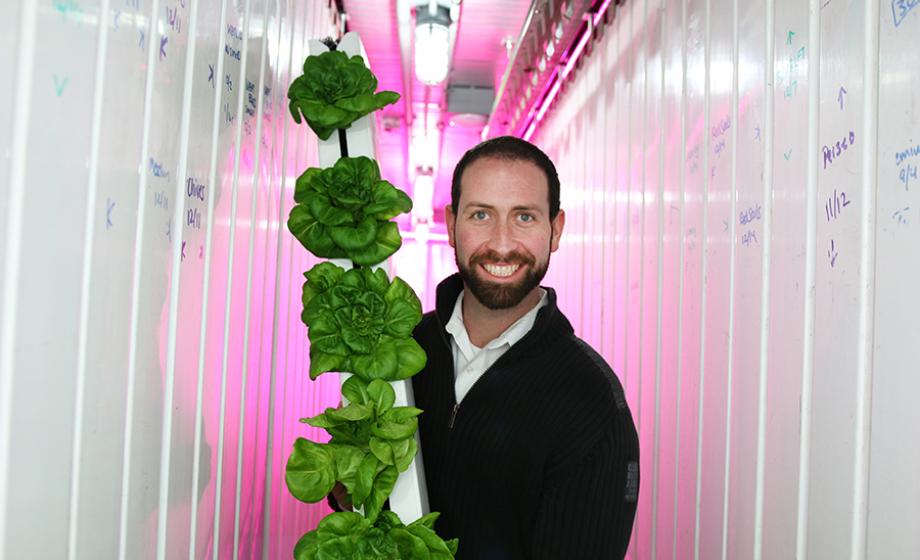 Brad McNamara displays a typical product of a Leafy Green Machine.