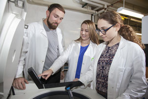 Noah Schwaegerle, Roela Bardhi and Lara Prosterman in lab