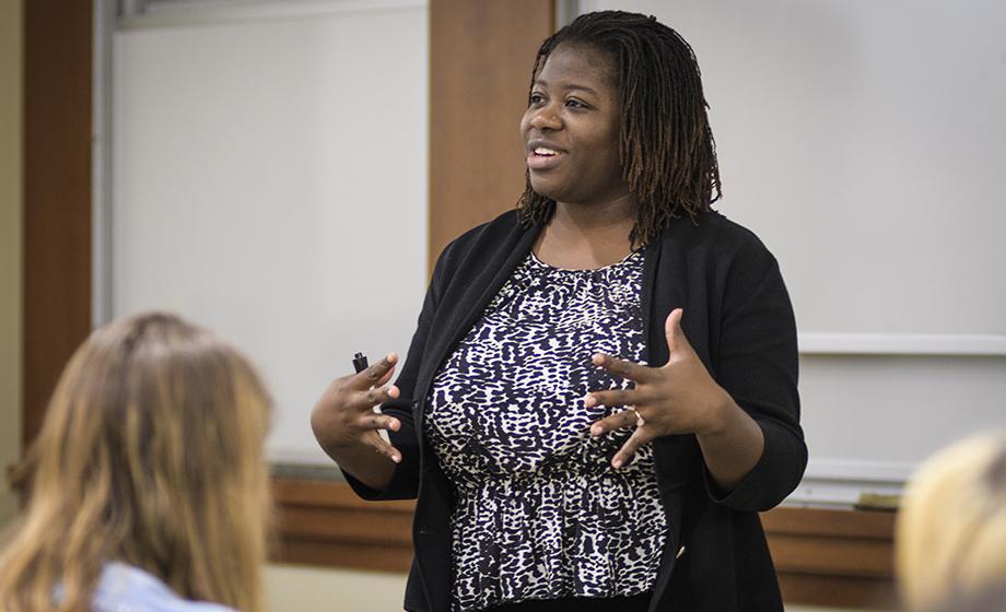 Nicole Overstreet, standing in front of class