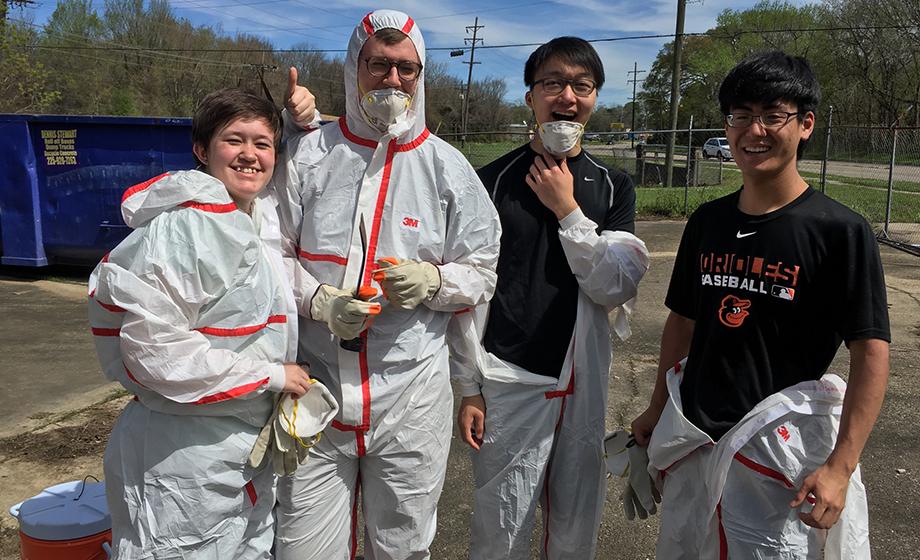 students in hazmat suits