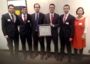 The Clark University team captured third place in the 2015 Boston Regional College Fed Challenge, an "intensely competitive" contest held at the Federal Reserve Bank of Boston (Nov. 6). Pictured, from left, are Jorge Galvez Rodriguez, Rahul Dutt, Associate Professor of Economics David Cuberes, Doga Bilgin, Roei Shimony, and Assistant Professor of Economics Chang Hong. 