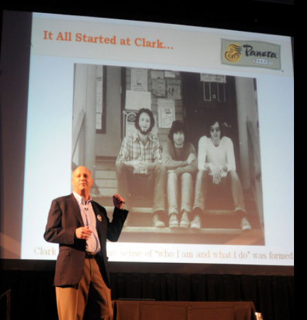 Ron Shaich next to slide photo