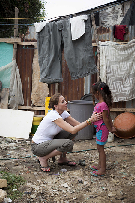 Catalina Escobar with child