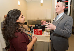 Christie Joyce ’16, M.S. ’17, talks with Clark alumnus Garrett Abrahamson ’07, M.B.A. ’08