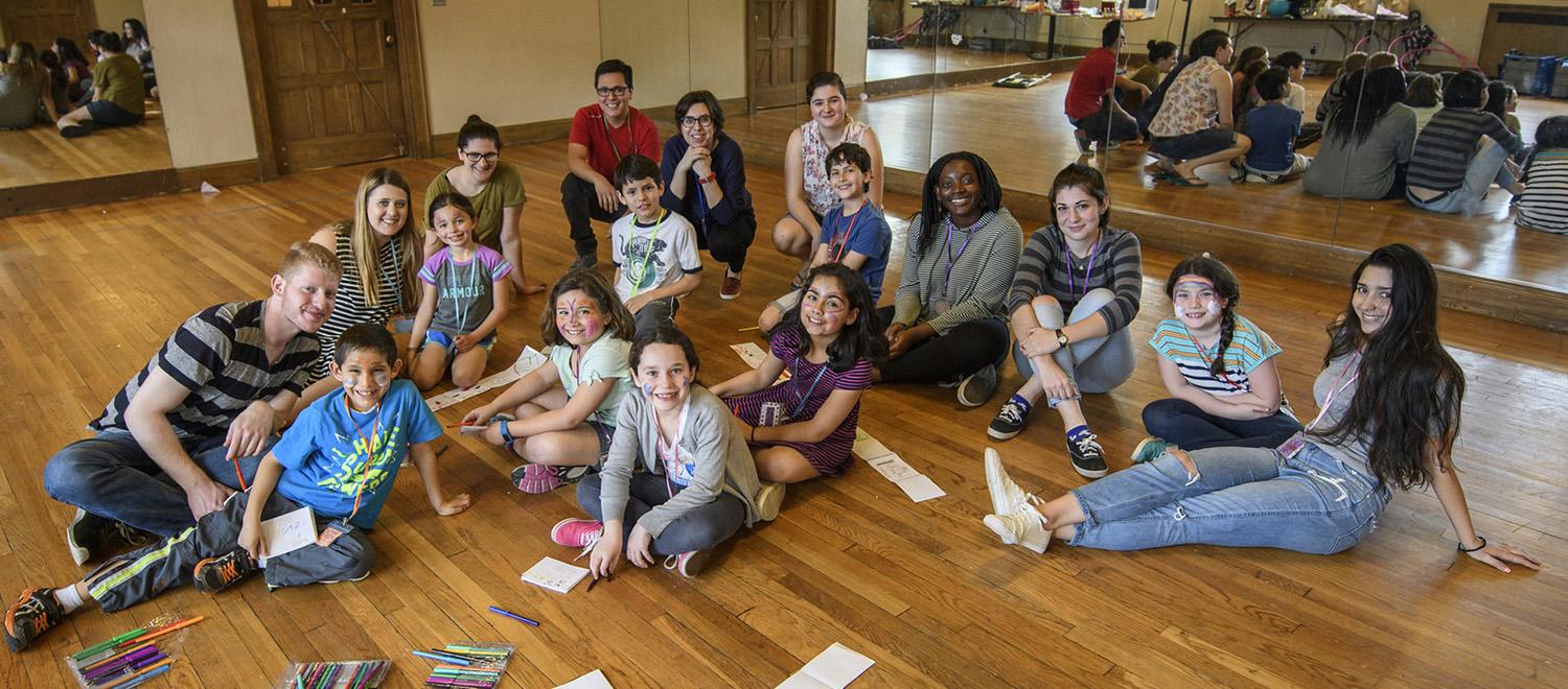 young students in class on the floor