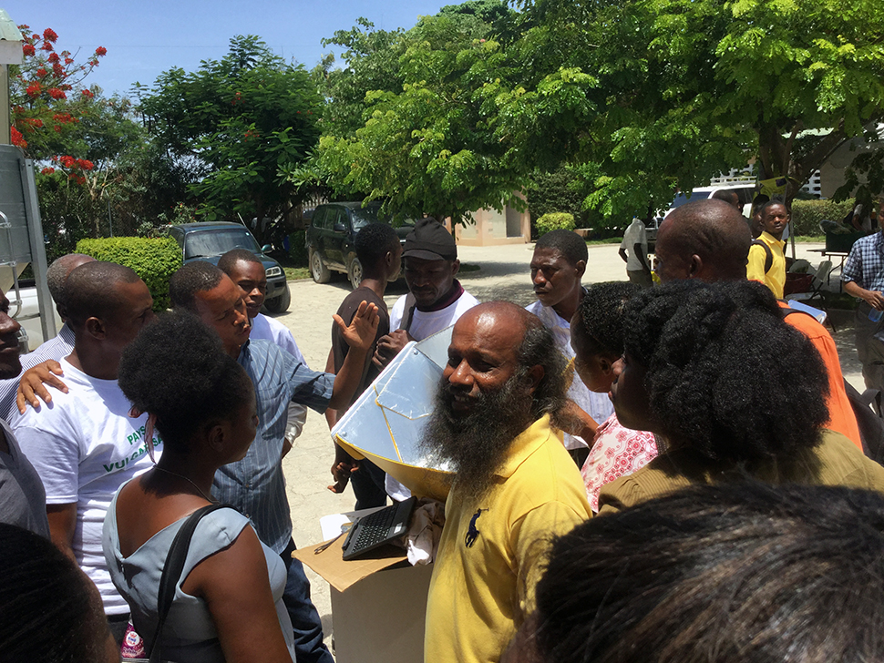 Jude Fernando watches the interest around a solar cooker