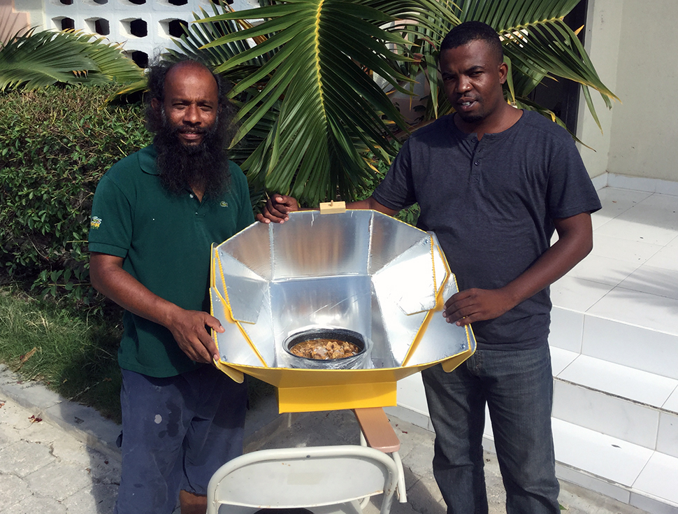 Jude Fernando with a solar cooker