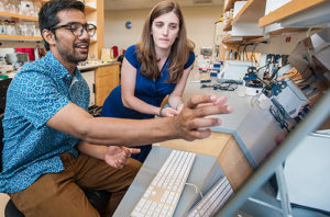 Navid Al Hossain '18 works with Assistant Professor Jacqueline Dresch on his research project.