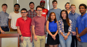 Students who made five-minute elevator pitches included, front, from left: Michael Gaiewski, Jiri Roznovjak, Tran Tran, Siu Ting Lam and Amiel Jaggernauth; back, from left: Jordan Majka, Navid Al Hossain, Yoni Hazan, Precious Oyem, David Berry, Siqi (Gillian) Yuan and Justin Wilbur.