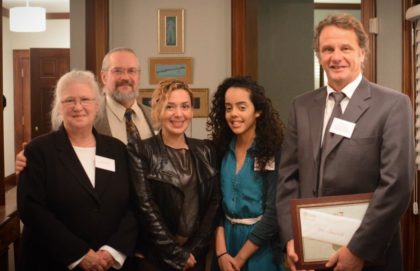 Members of the Main South Community Development Corporation (MSCDC) were on hand to help Clark celebrate Executive Director Steve Teasdale’s 25-year commitment. Pictured, from left, are Barbara Haller (Board Member), Mark Waters (President of the Board), Yary Jaen (Director of Programs), and Jen Tejeda (Clark University work-study student at MSCDC).  (Photo: Jonathan Edelman, Clark Class of 2016)