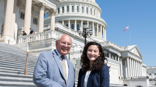 Sara Conroy shakes the hand of congressman Paul Tonko, on steps of Capitol in Washington, D.C.