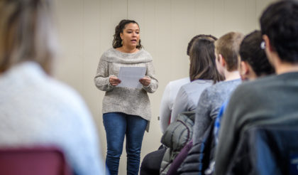 A student in Readings in Hispanic Literatures reads poetry by Juan Matos