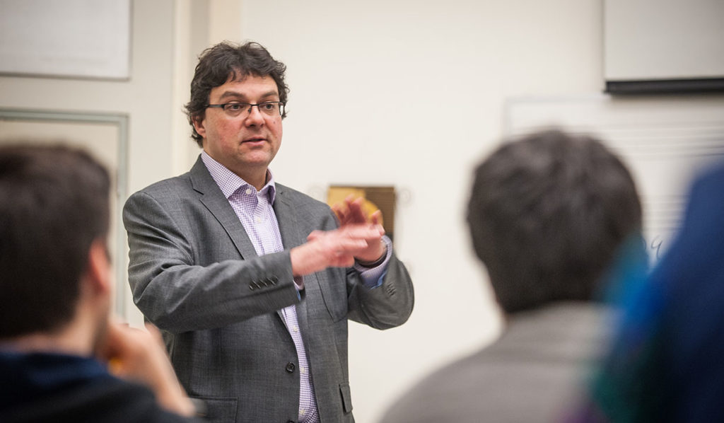 Music Professor Benjamin Korstvedt talks to an audience