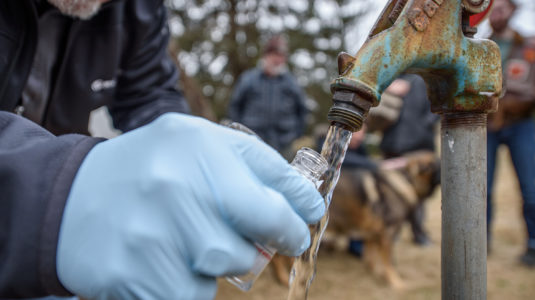 Water samples being collected