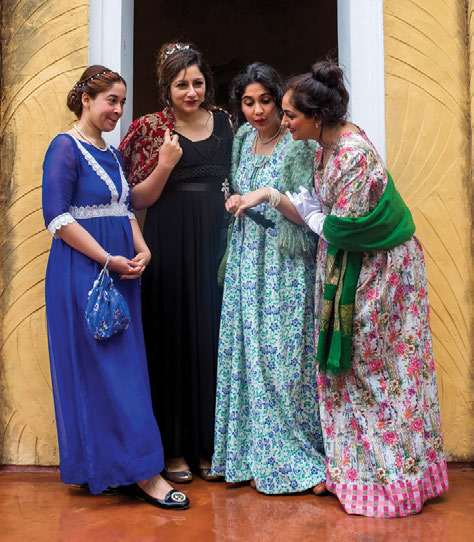 Laaleen Sukhera with friends at an Austen tea.