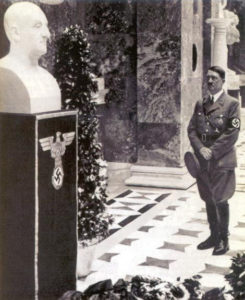 Hitler looking at marble bust of Anton Bruckner