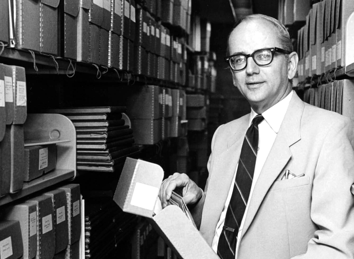 William Koelsch in the Goddard Library stacks