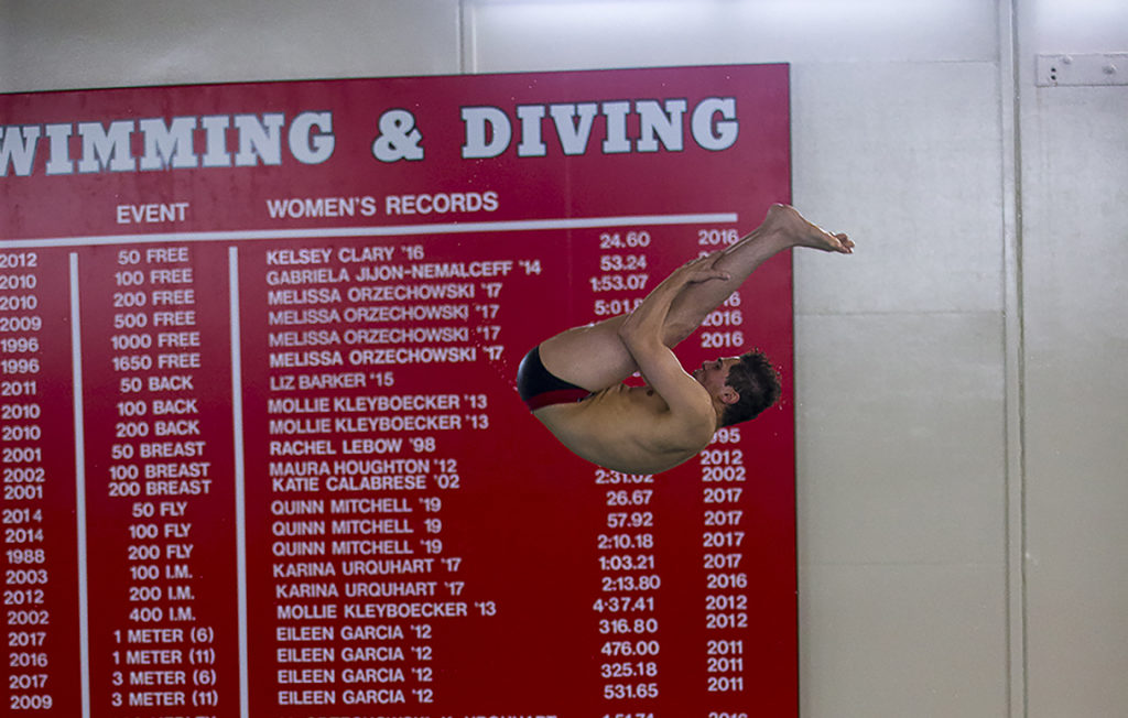 Steve Castiglione '18 diving at Clark University