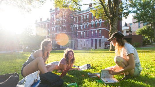 Students on the Clark University campus green