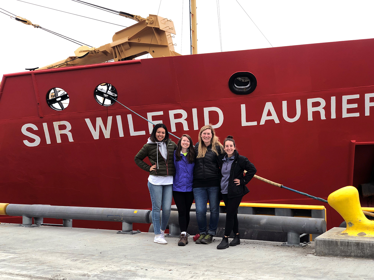 Four Clarkies standy the Sir Wilfrid Laurier.