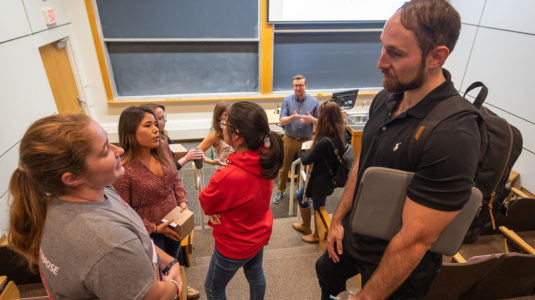 Noah Schwaegerle ’17, M.S. ’18, and Emilie Ogisu’17, M.S. ’18, chat with Clark students before speaking at Professor Don Spratt’s class “LEEPing into a Science Career.”