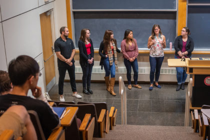 Alumni speak to students about their jobs in the sciences.