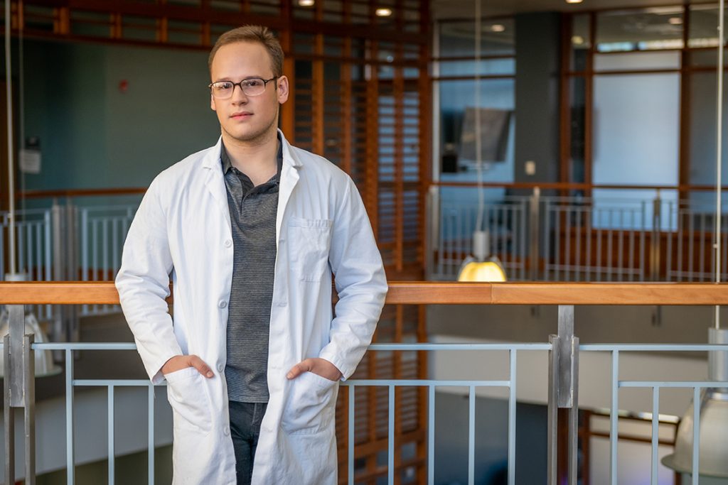 Lucas Brandao in lab coat