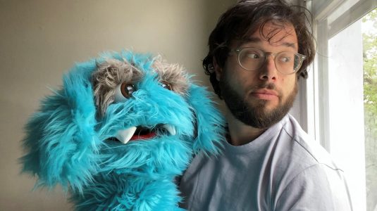 Avi Steinhardt '05 and his monster puppet, Louie