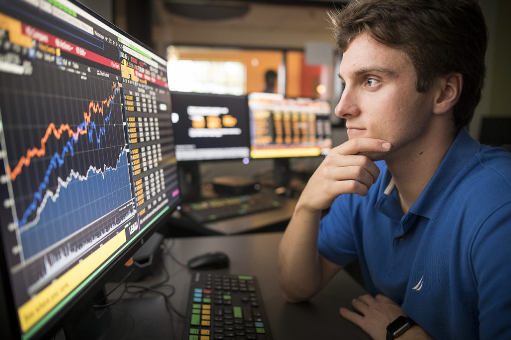 Clark master of finance student at Bloomberg terminal