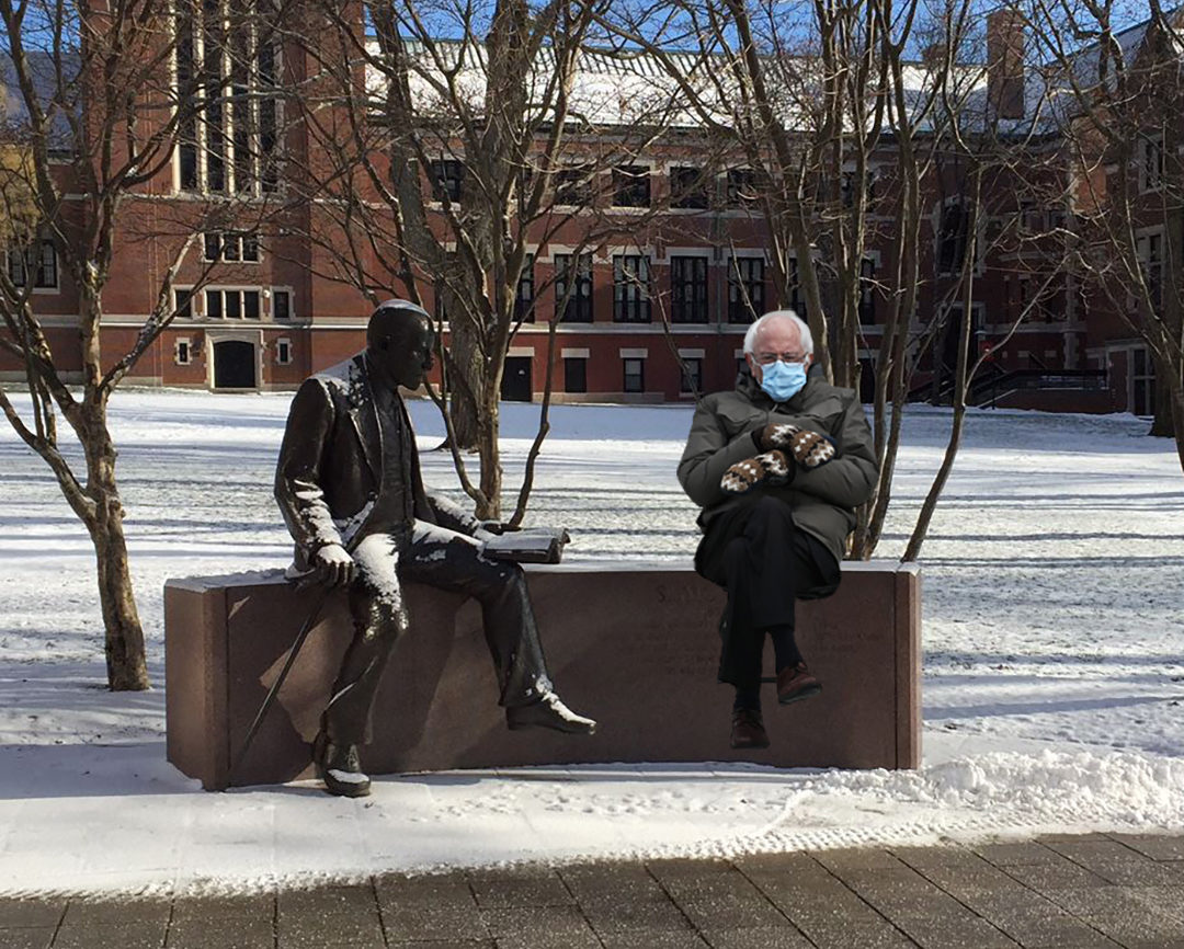 meme of Bernie Sanders sitting next to freud statue at Clark