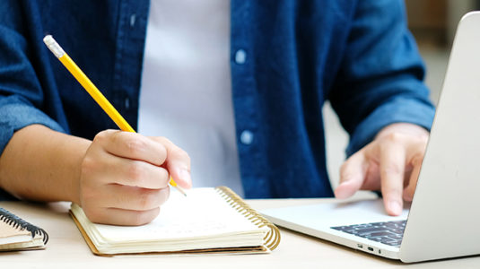 student at laptop