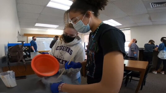 Students make ice cream in Kitchen Chemistry course