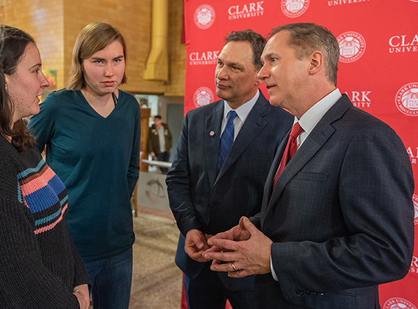 David Fithian (right) and Michael Rodriguez greet students after the January 13, 2020 program when Fithian was announced as Clark's new president.