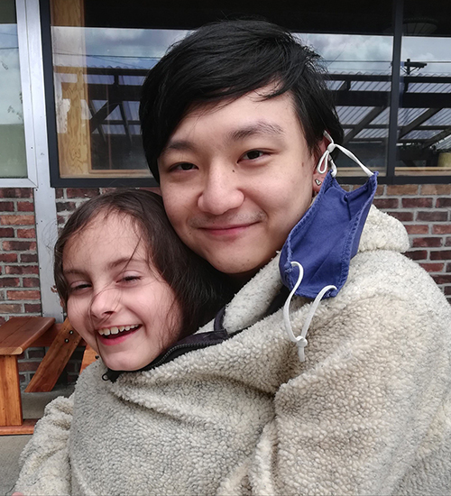 Calvin Choi '12 with his 8-year-old daughter, Shoshanna.