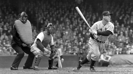 Lou Gehrig swings a bat during a game with the New York Yankees