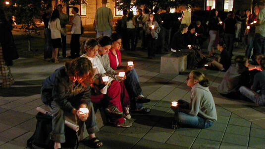 Students attend a candlelight vigil at Clark on Sept. 11, 2001