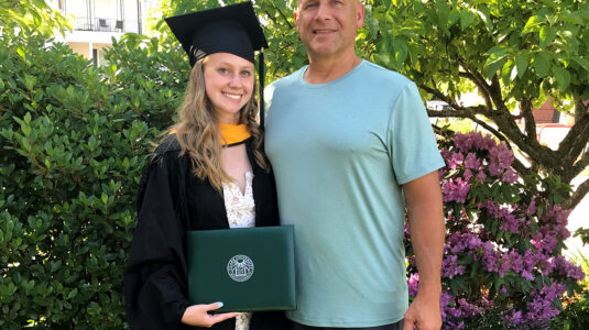 Mariah Torcivia ’20, M.S. ’21, with her father, Salvatore, after her master's graduation at Clark.